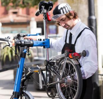 Man fixes bike 